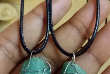 raw emerald pendants