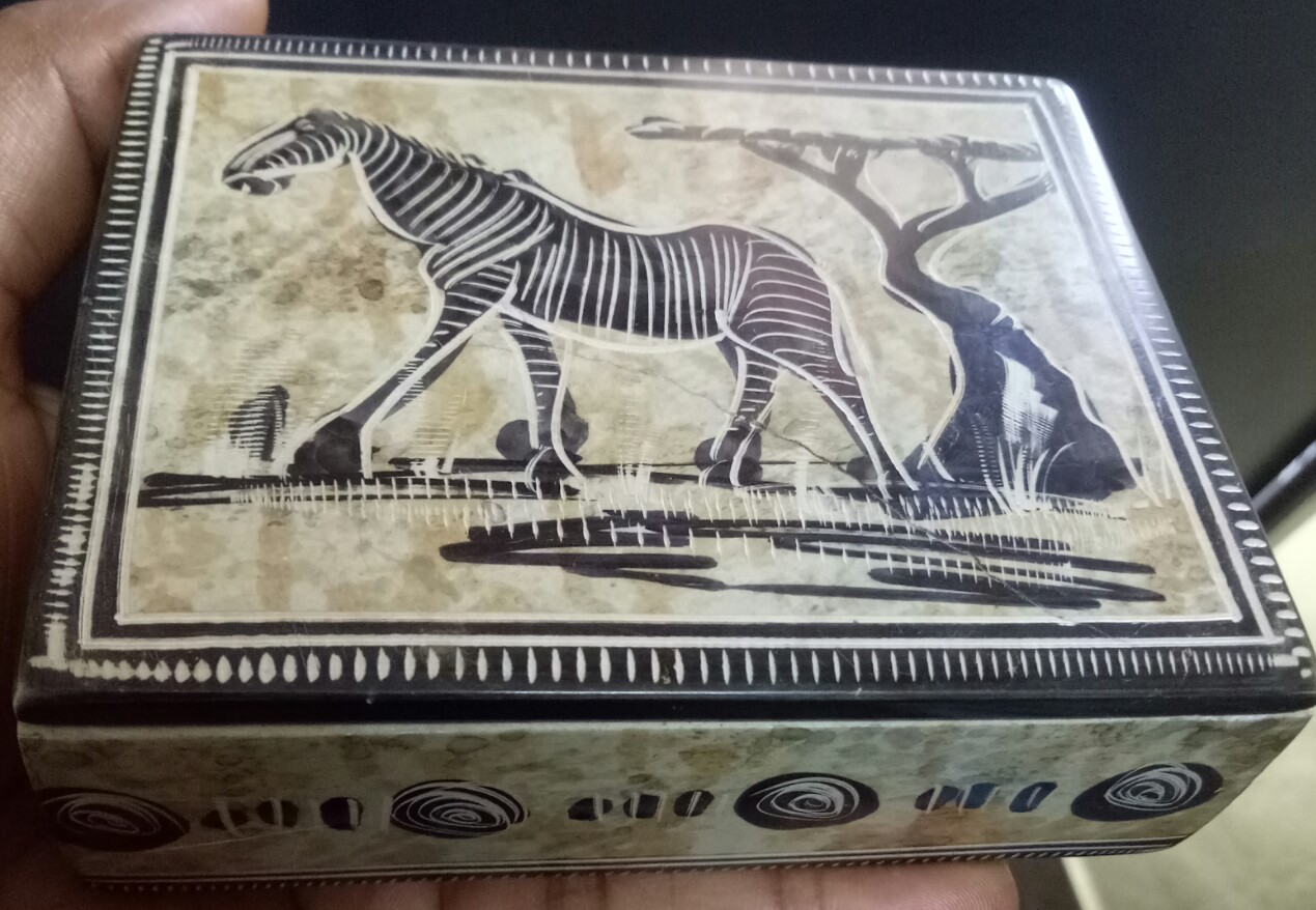 carved soapstone jewerly trinket box with zebra  african design on