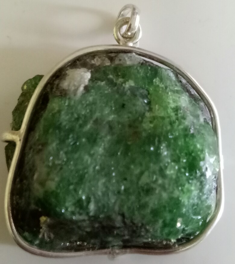 green garnet pendants from tanzania